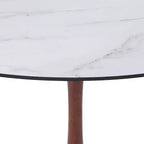 Cette table à manger ronde, dotée d'un plateau en panneau de fibres de moyenne densité et d'un piètement en acier couleur cerise, est une table d'appoint moderne adaptée aux cuisines, aux salles à manger et aux petits espaces.