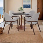 Cette table à manger ronde, dotée d'un plateau en panneau de fibres de moyenne densité et d'un piètement en acier couleur cerise, est une table d'appoint moderne adaptée aux cuisines, aux salles à manger et aux petits espaces.