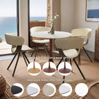 Cette table à manger ronde, dotée d'un plateau en panneau de fibres de moyenne densité et d'un piètement en acier couleur cerise, est une table d'appoint moderne adaptée aux cuisines, aux salles à manger et aux petits espaces.